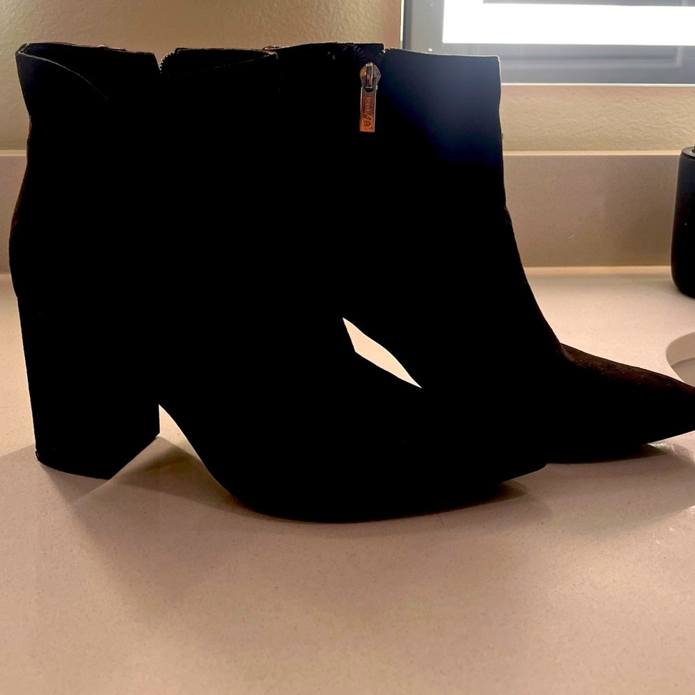 Black booties lightly worn